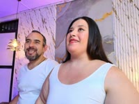 We are a Latin couple who enjoys living every moment with complicity, trust, and lots of fun. Our connection is real, and that is what we most like to share. We love laughing, chatting, getting to know each other a little more every day, and opening the doors of our world to those looking for an authentic experience.

She is sweet, spontaneous, and has a mischievous side that shows when she feels comfortable. He is calm, confident, and always finds a way to bring a smile. Together we form the perfect balance between tenderness, good humor, and a chemistry that is noticeable from the first glance.

Here you will not only find a couple; you will find two people who enjoy meeting people from all over the world, discovering new stories, and creating an environment where everyone can feel welcome. We like interesting conversations, jokes, challenges, music, and those little moments that make each broadcast different.

We believe that the best connections are born from trust and respect. That is why we want everyone who visits our room to enjoy a relaxed, fun space full of good energy. We love interacting with our community, listening to their ideas, and always surprising them with something new.

If you decide to join us, we hope to give you laughter, good times, and an experience that makes you want to come back. We are passionate about sharing quality time, creating memories, and showing that true chemistry cannot be faked.

Relax, get comfortable, and come meet us. Maybe you will discover that the best stories begin with a simple "Hello"... and this could be one of them.